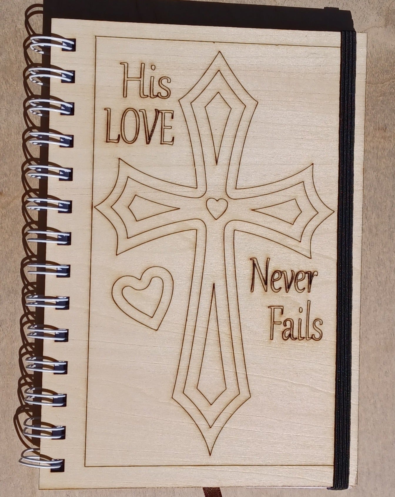 His Love Never Fails Wooden Notebook